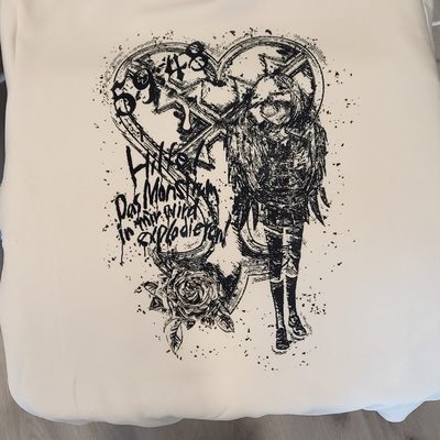 Custom sweater featuring a collage of my favorite media